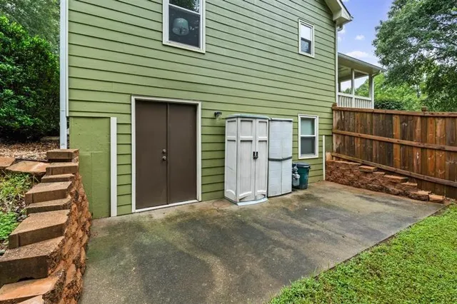 a front view of a house with a garage