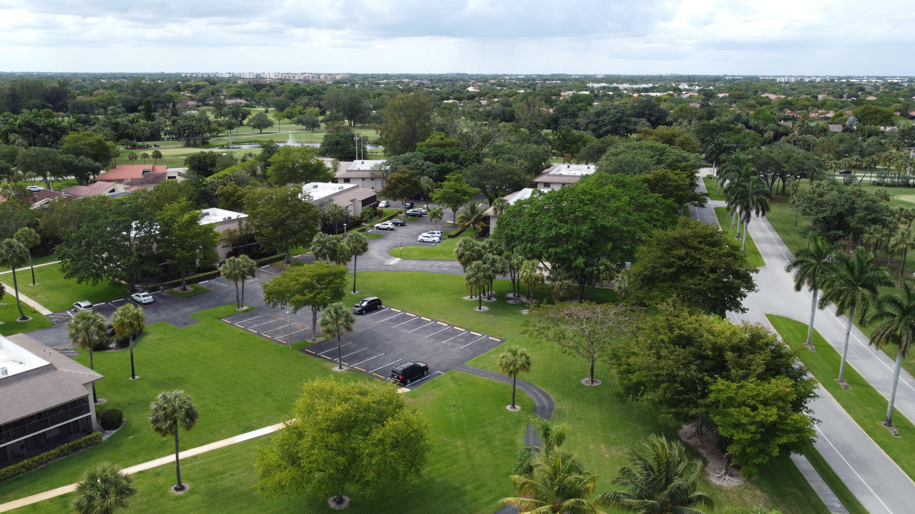 297 Deer Creek Boulevard, Unit 1305 Deerfield Beach, FL 33442 - Photo 13 of 51 an aerial view of multiple house