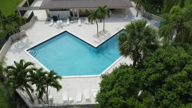 a view of swimming pool from a balcony