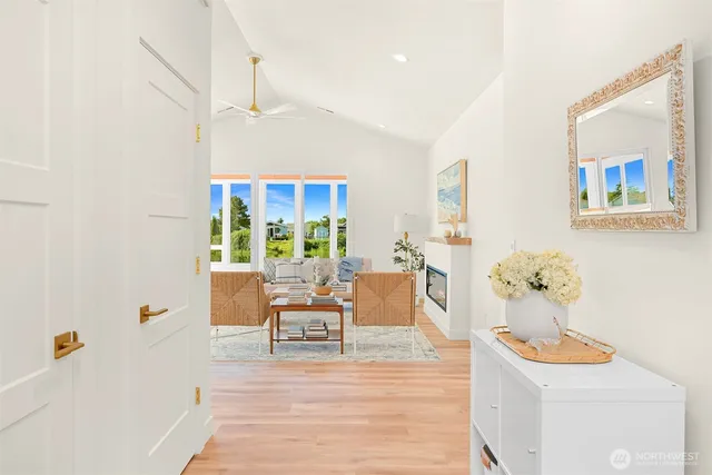 a living room with furniture and a table