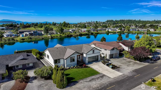 an aerial view of a house with a garden