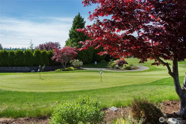 a view of a golf course with a garden