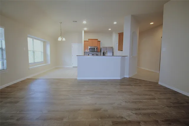a view of a kitchen with a sink and a kitchen