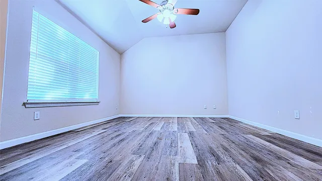 a large bathroom with a glass door shower