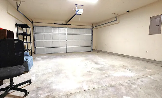 a view of a backyard with wooden fence