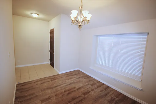 a view of hallway with a window