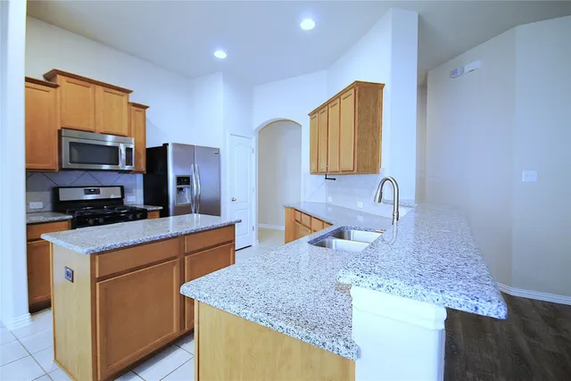 a view of a windows & cabinet in a room