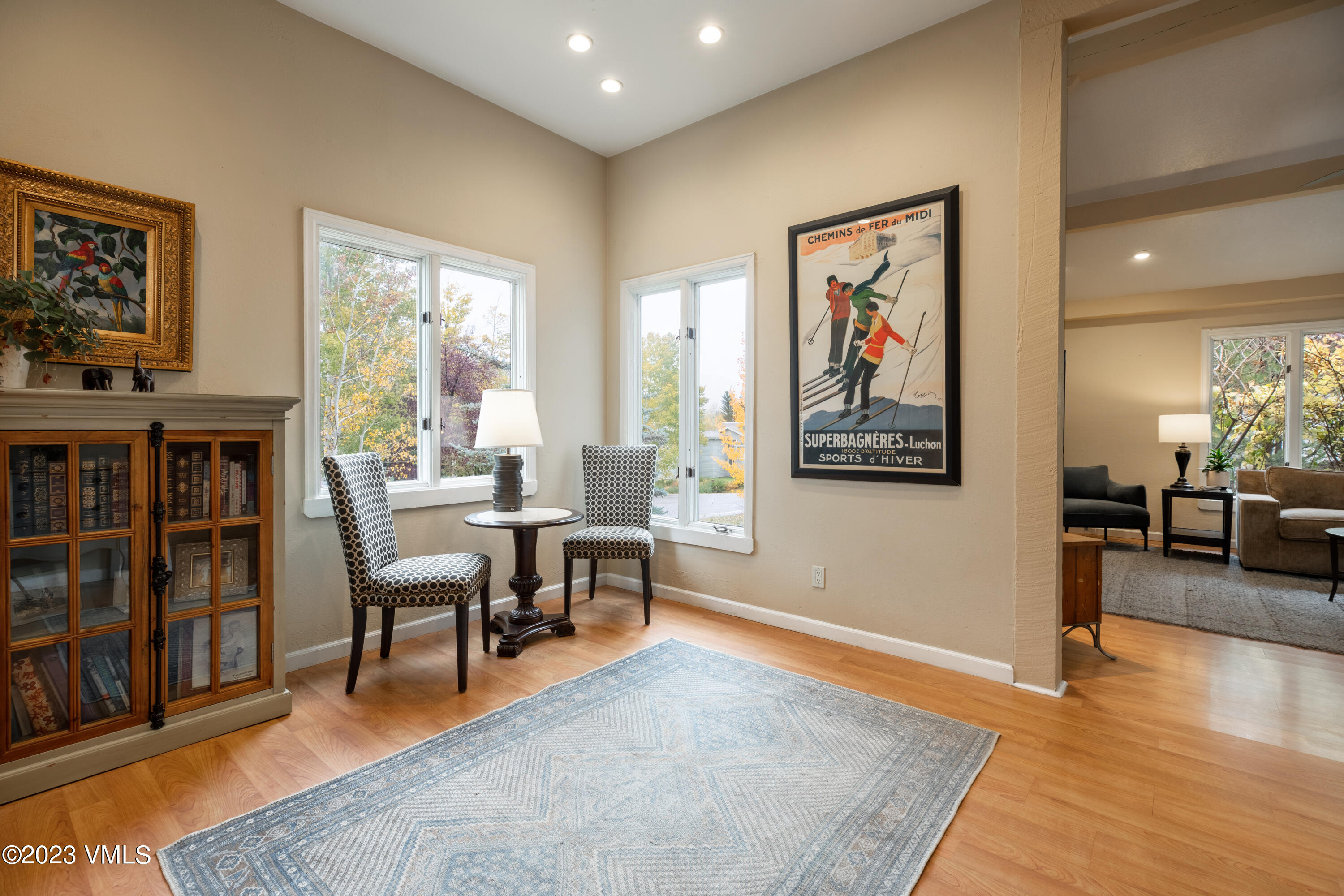 1176 Deer Boulevard, Unit A Avon, CO 81620 - Photo 2 of 8 a living room with furniture and a table