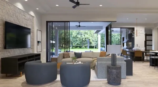 a living room with fireplace furniture and a flat screen tv