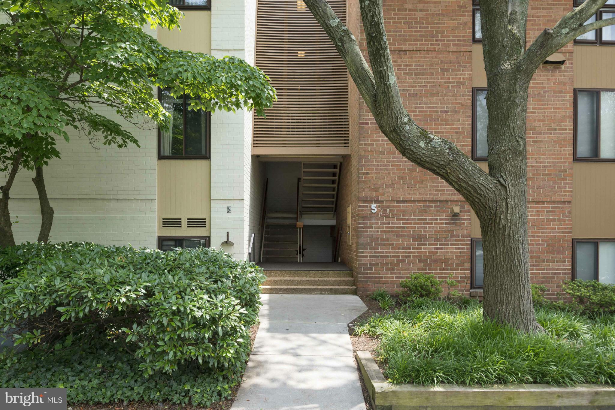 5 Hamill Road, Unit 5C Baltimore, MD 21210 - Photo 1 of 24 a front view of a house with garden