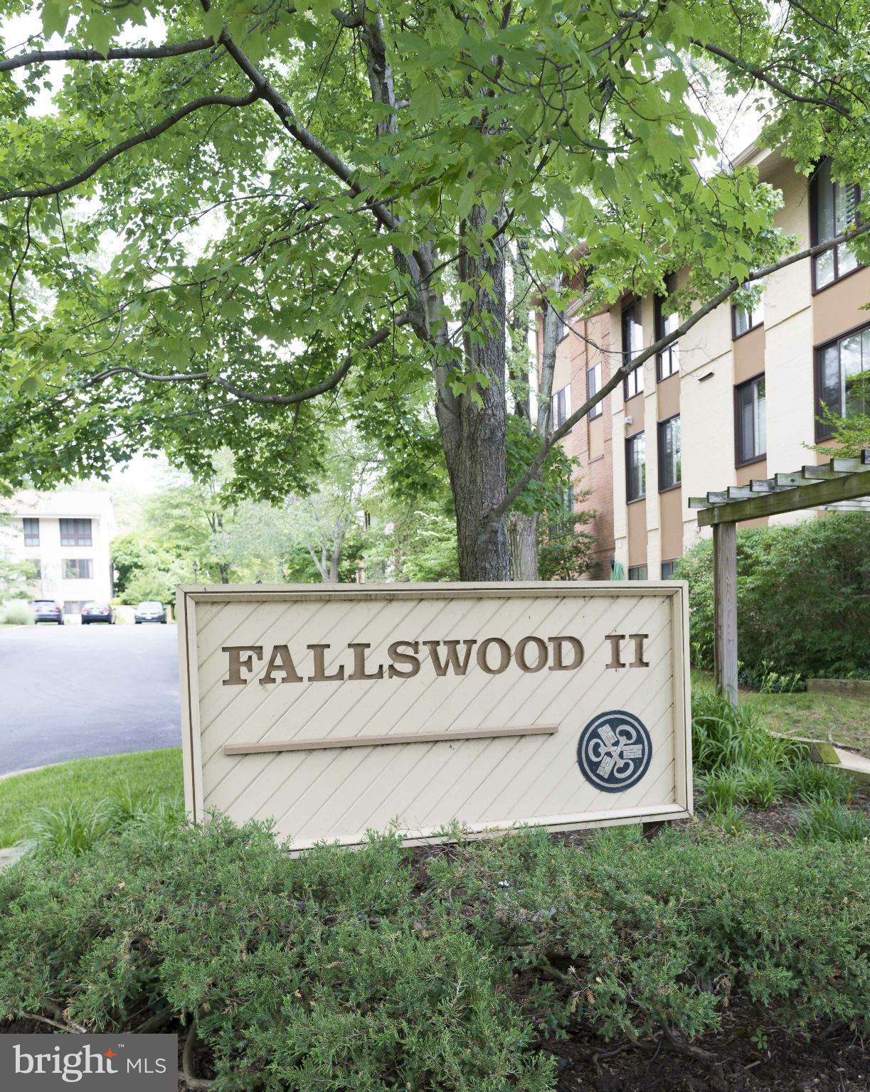 5 Hamill Road, Unit 5C Baltimore, MD 21210 - Photo 2 of 24 a view of a street sign under a large tree
