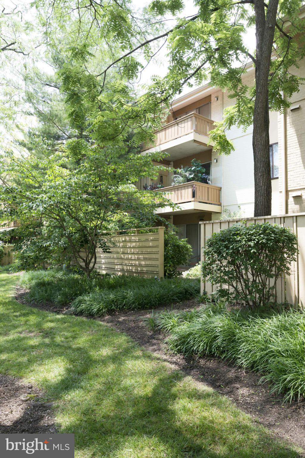 5 Hamill Road, Unit 5C Baltimore, MD 21210 - Photo 3 of 24 a view of a house with a yard