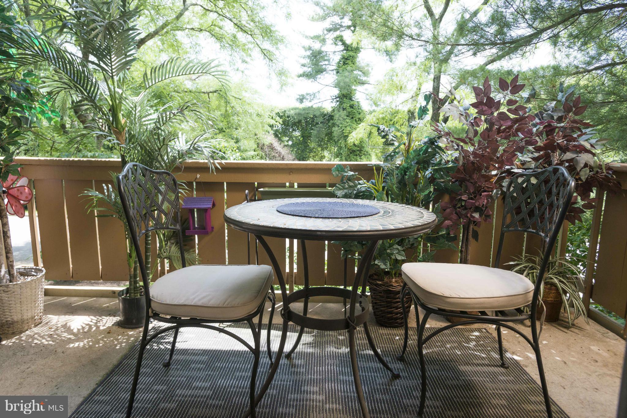 5 Hamill Road, Unit 5C Baltimore, MD 21210 - Photo 21 of 24 a view of a chairs and table in the patio