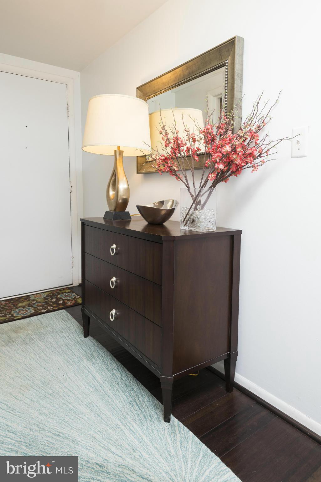 5 Hamill Road, Unit 5C Baltimore, MD 21210 - Photo 4 of 24 a view of a room with a chandelier