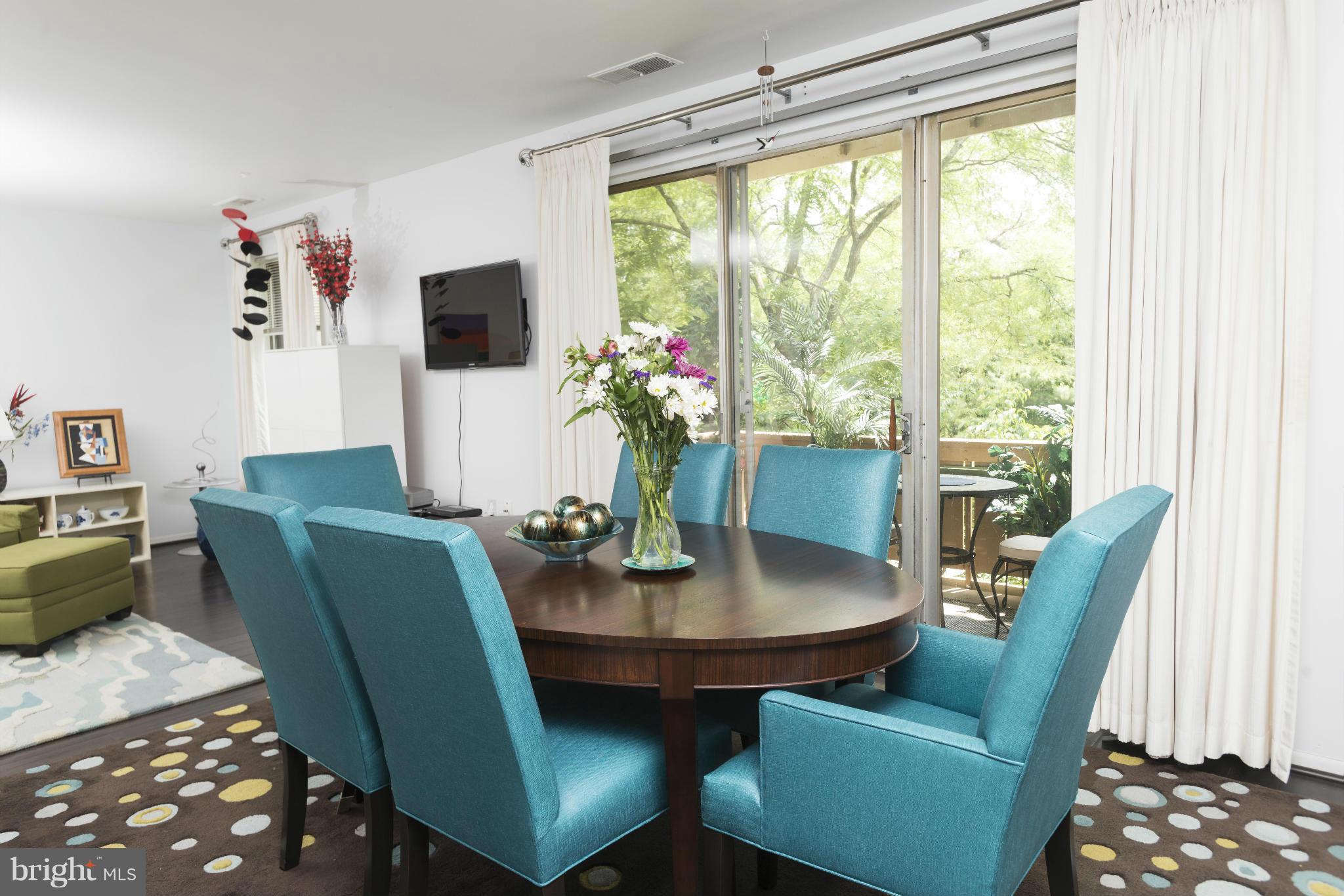 5 Hamill Road, Unit 5C Baltimore, MD 21210 - Photo 9 of 24 a view of a dining room with furniture window and outside view