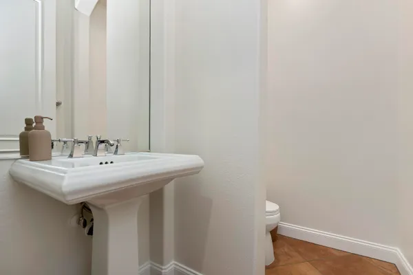a bathroom with a sink and a toilet