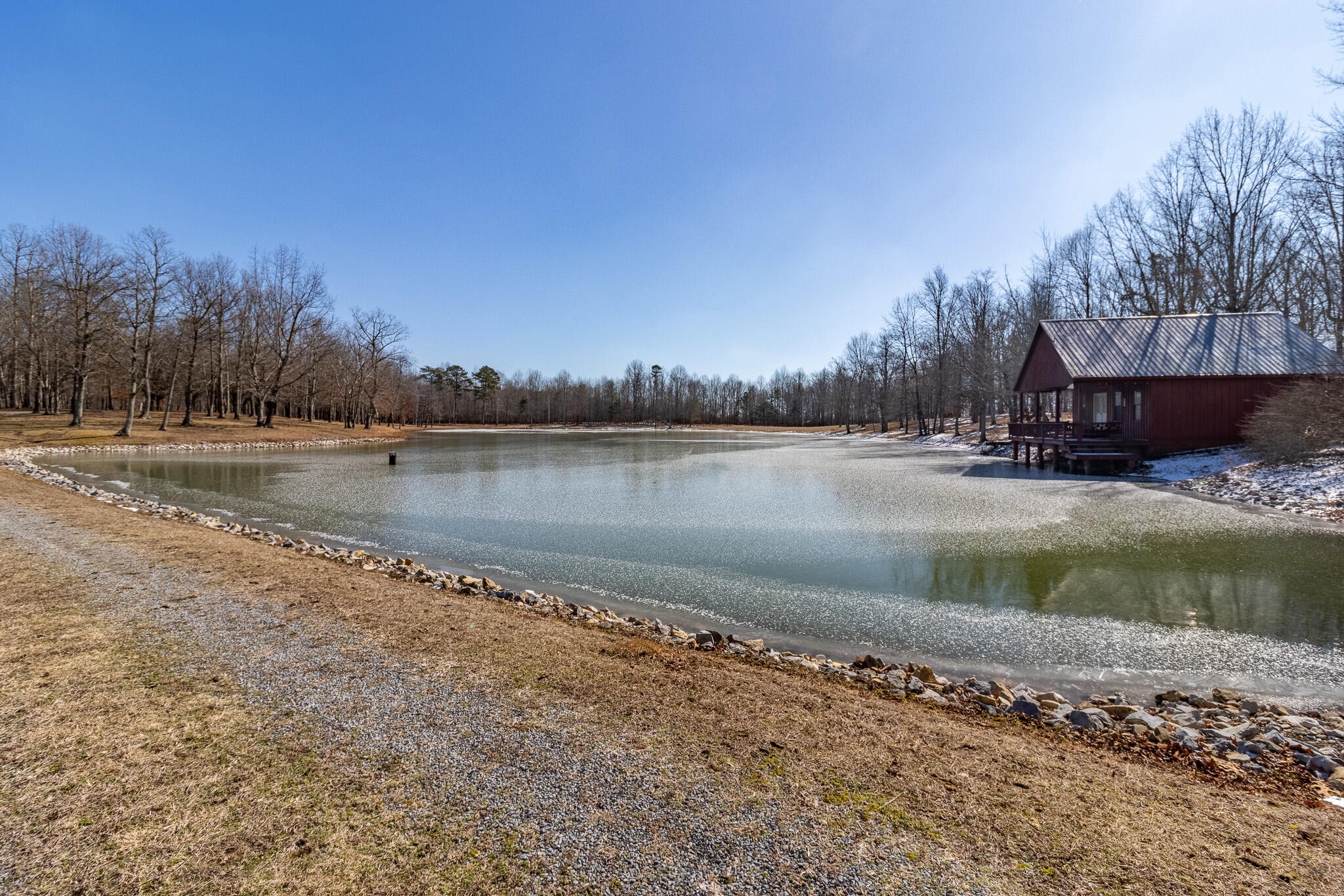 1844 Hobbstown Road Dunlap, TN 37327 - Photo 13 of 81 a view of a lake with houses in the background