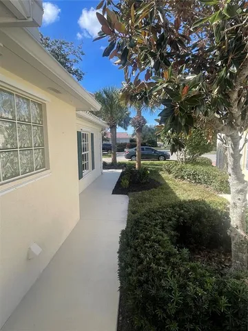 a view of a backyard of the house