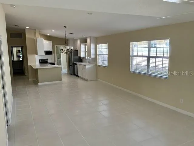 a large en suite bathroom with sink shower and a bathtub
