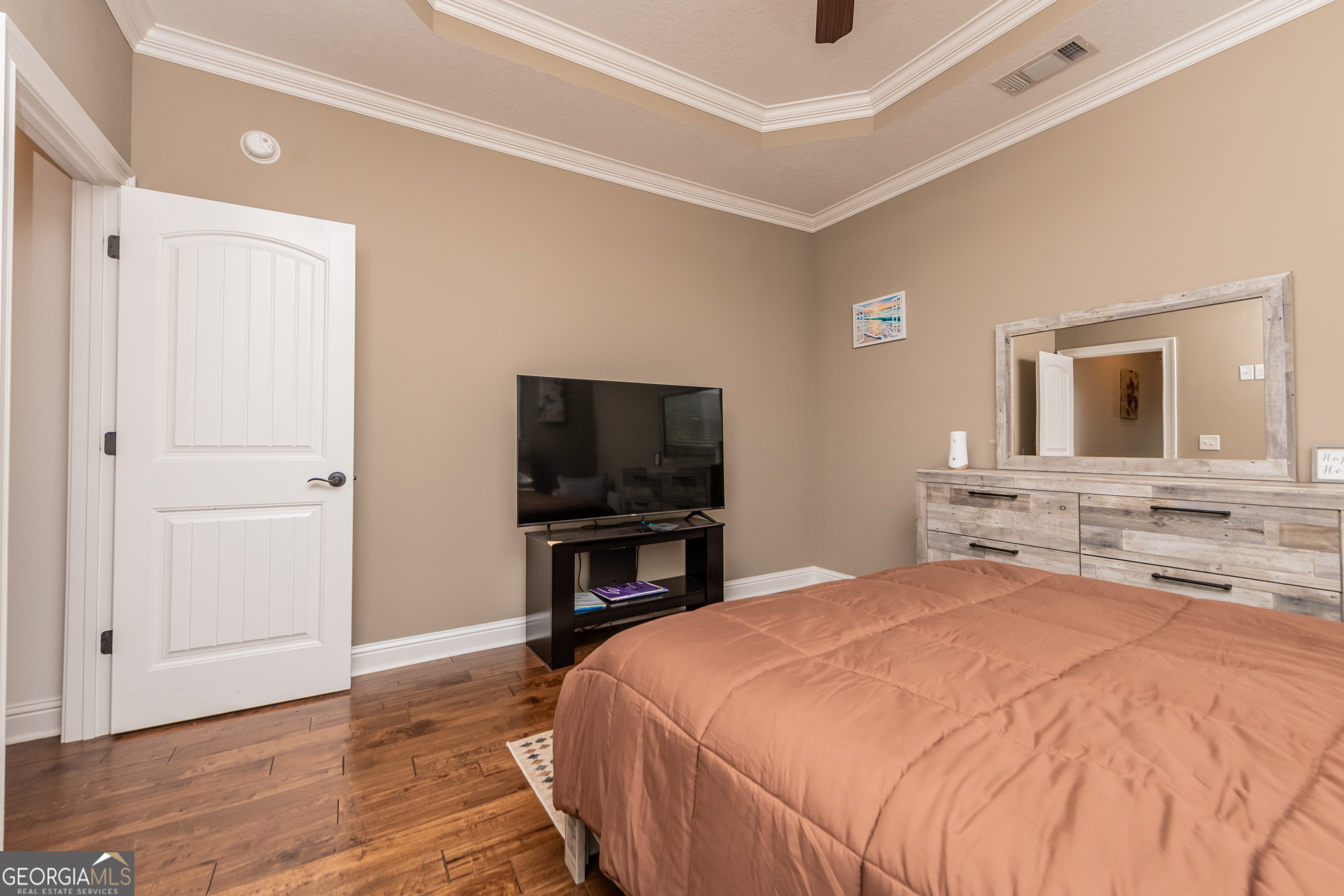 405 Old Bridge Road Warner Robins, GA 31088 - Photo 35 of 55 a bedroom with a bed and a flat screen tv