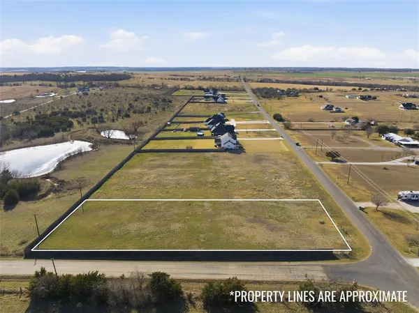 a view of an ocean and city