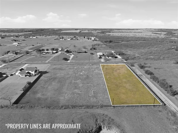 an aerial view of beach and ocean