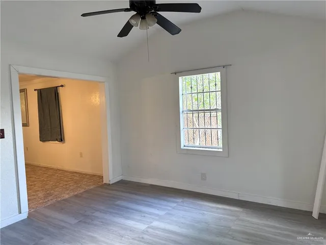 a kitchen with sink and cabinets
