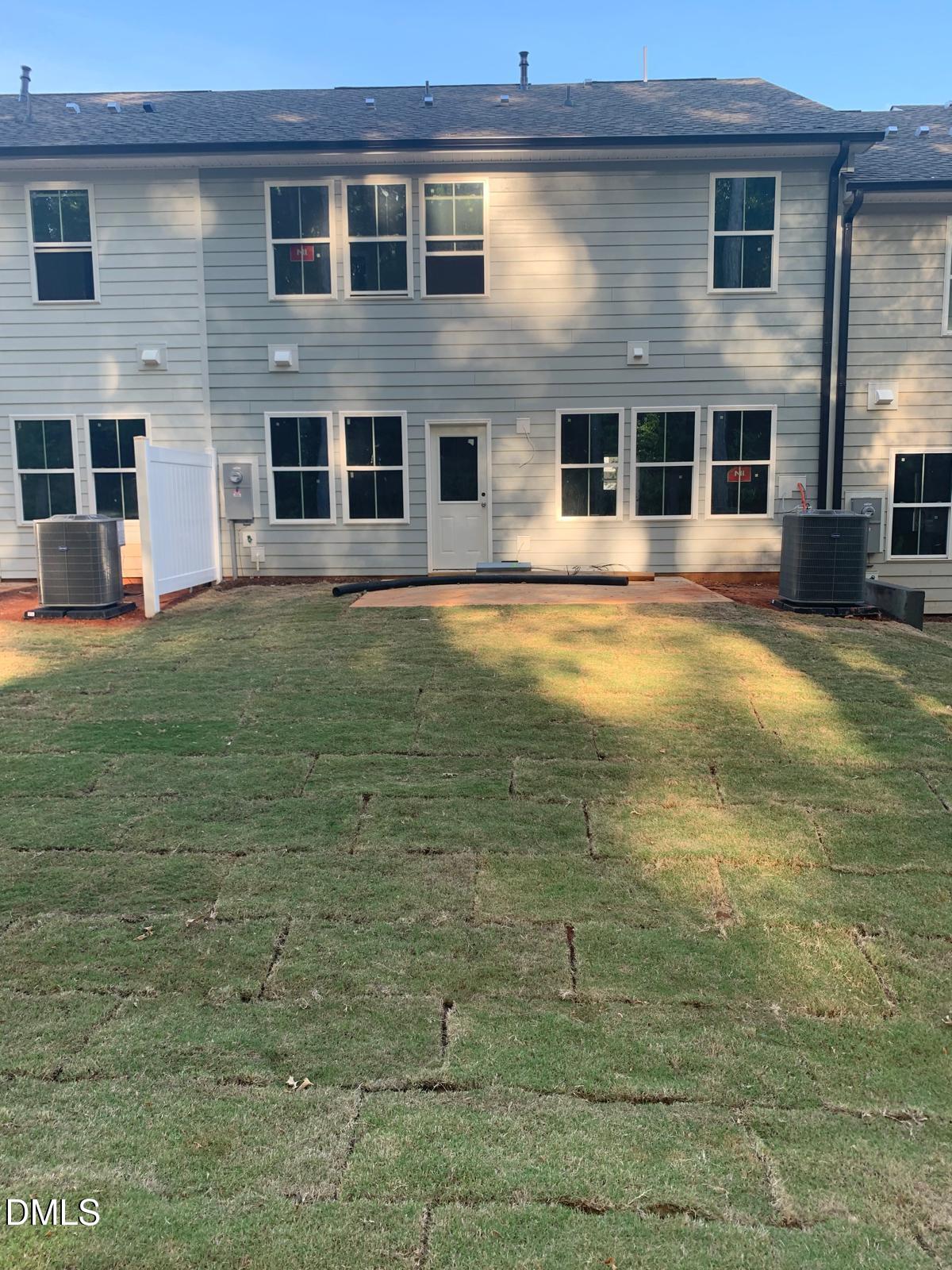 233 Broomside Avenue Raleigh, NC 27603 - Photo 12 of 18 a house view with swimming pool in front of it
