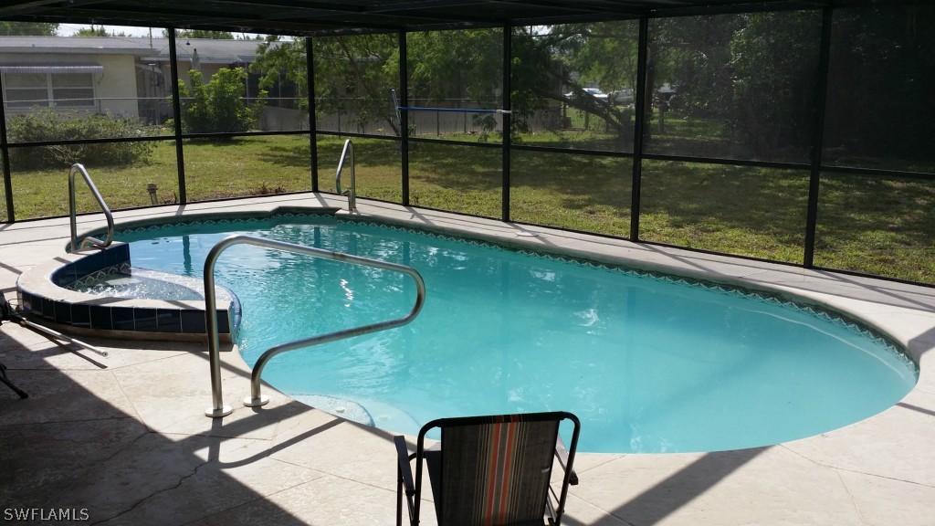 102 Jasmine Road West Lehigh Acres, FL 33936 - Photo 5 of 12 a view of a balcony