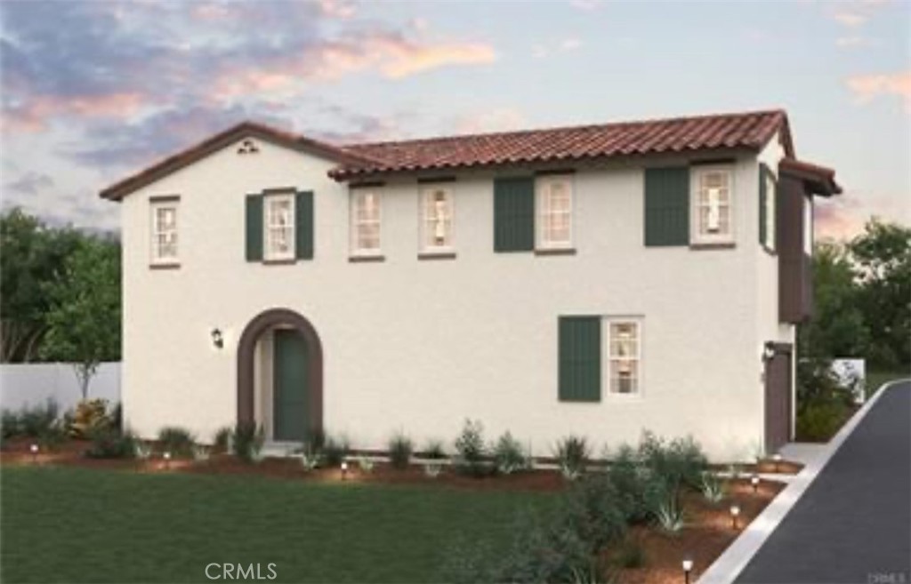 a house view with a garden space