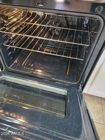 a white refrigerator freezer sitting in a kitchen