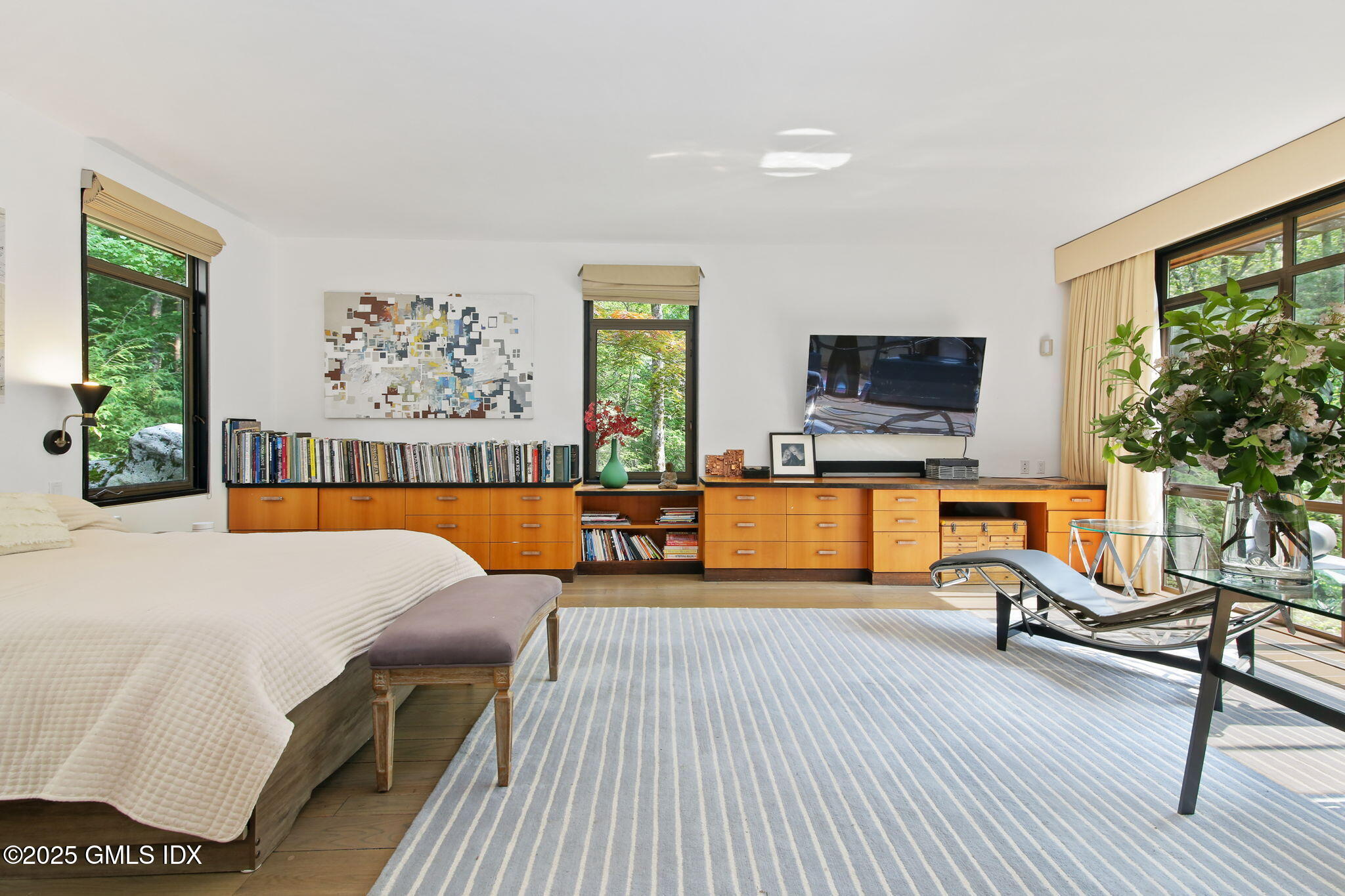 21 Hycliff Road Greenwich, CT 06831 - Photo 12 of 25 a living room with furniture and a flat screen tv