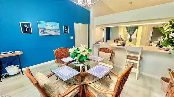 a view of a dining room with furniture