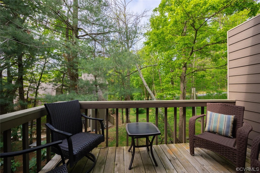 485 Three Ridges Roseland, VA 22967 - Photo 23 of 48 a view of a chair and table on the wooden deck