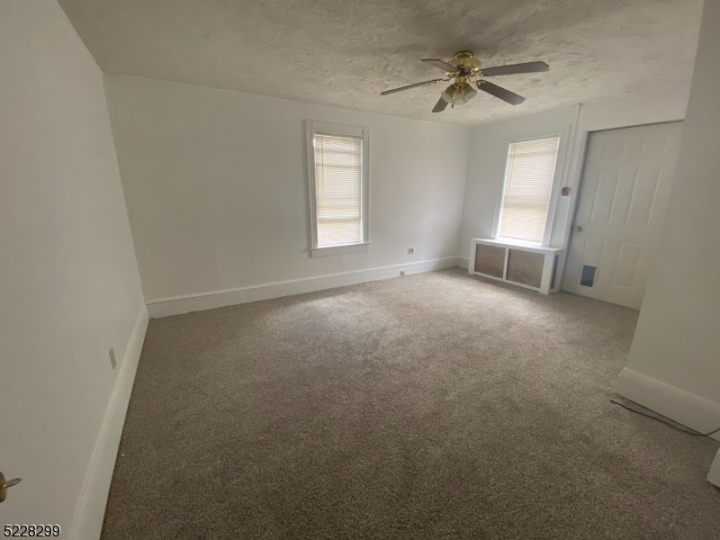 9 Dock Road Denville, NJ 07866 - Photo 15 of 21 an empty room with windows and fan