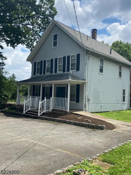 9 Dock Road Denville, NJ 07866 - Photo 2 of 21 a front view of a house with a yard