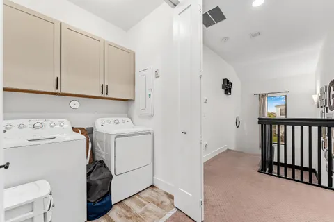 a view of utility room with dryer and washer