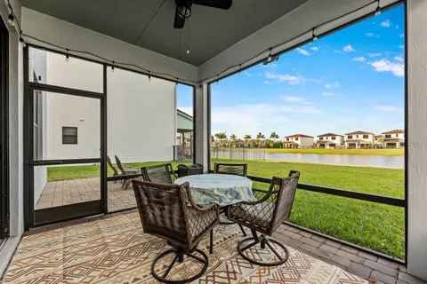 a view of an outdoor space with furniture and garden