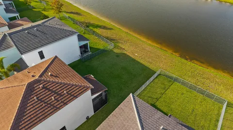 a view of a backyard with sitting area