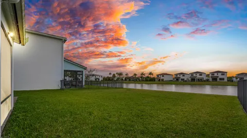 a view of a lake with a big yard