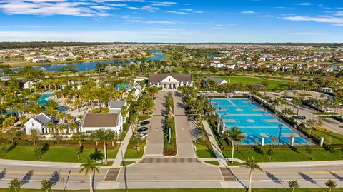 an aerial view of residential building with parking space