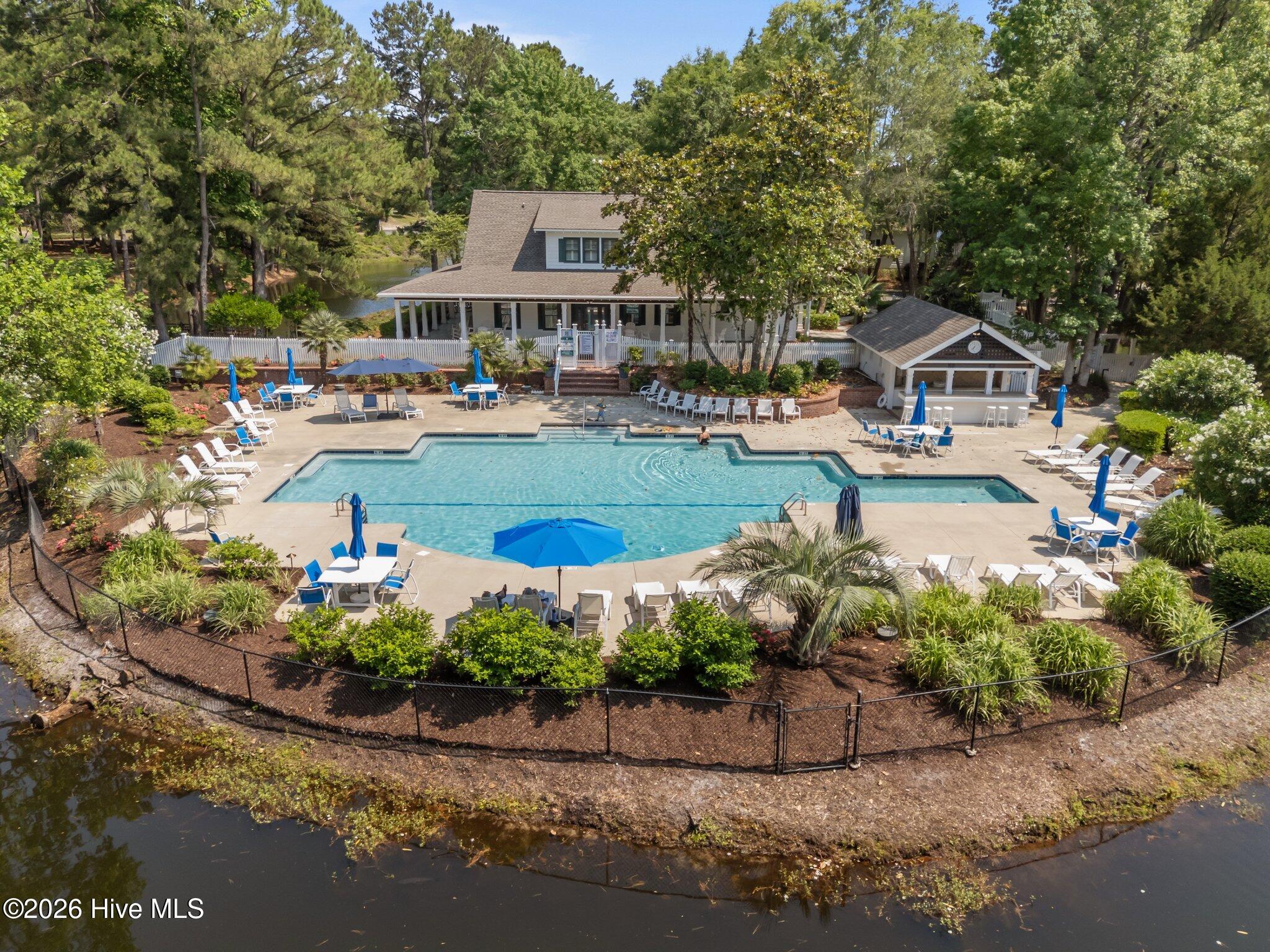 9099 Fountain Street Southwest Calabash, NC 28467 - Photo 29 of 32 Clubhouse & Pool
