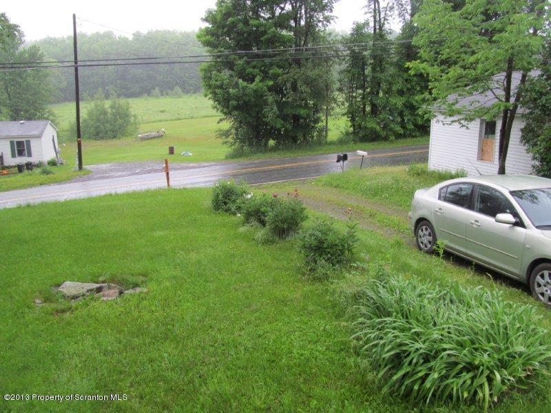 2140 Madisonville Road Moscow, PA 18444 - Photo 7 of 23 a view of a garden with a slide
