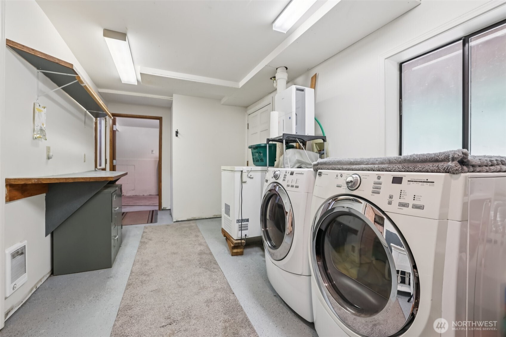 17209 West Riverside Drive Bothell, WA 98011 - Photo 21 of 39 a view of a hallway with washer and dryer