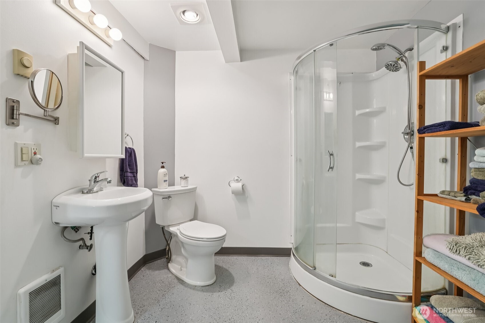17209 West Riverside Drive Bothell, WA 98011 - Photo 22 of 39 a bathroom with a sink toilet and shower