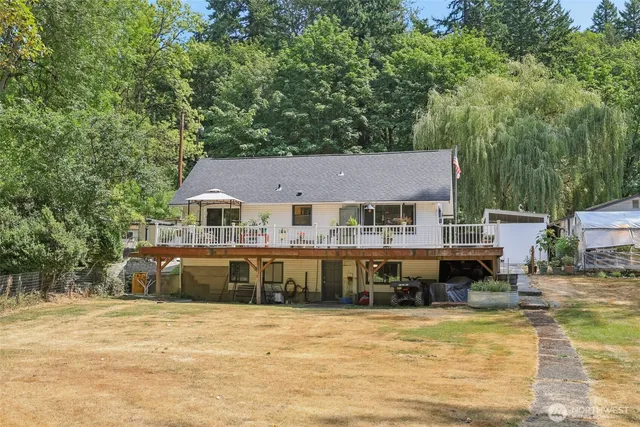 a aerial view of a house with swimming pool