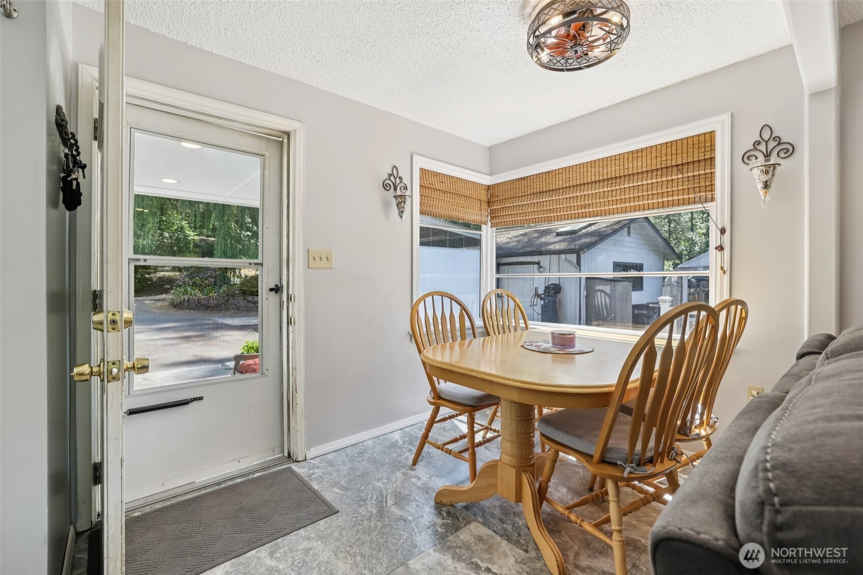 17209 West Riverside Drive Bothell, WA 98011 - Photo 8 of 39 a view of a dining room with furniture window and outside view