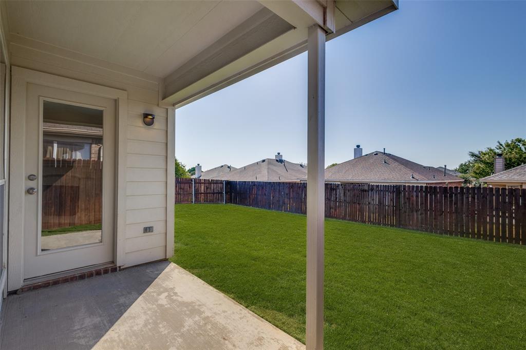 1257 Barrel Run Fort Worth, TX 76052 - Photo 22 of 29 a view of a house with backyard and porch