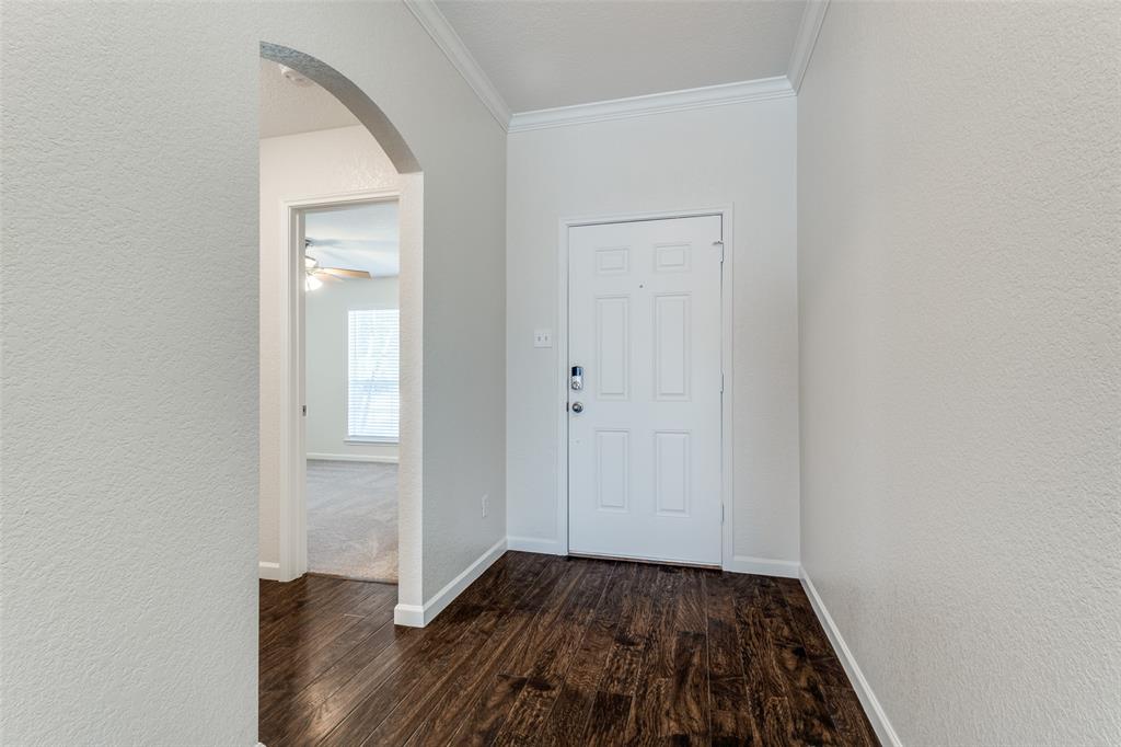 1257 Barrel Run Fort Worth, TX 76052 - Photo 4 of 29 an empty room with wooden floor and closet