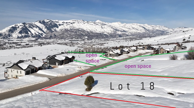 4500 North Seven Bridges Road, Unit 18 Eden, UT 84310 - Photo 15 of 15 Snowy aerial view with a residential view and a mountain view